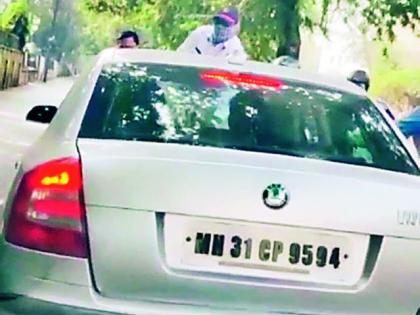 The traffic police were escorted to the bonnet of the car; The sensation caused by the viral video | वाहतूक पोलिसाला कारच्या बोनेटवर बसवून फरफटत नेले; व्हायरल व्हिडीओने उडविली खळबळ