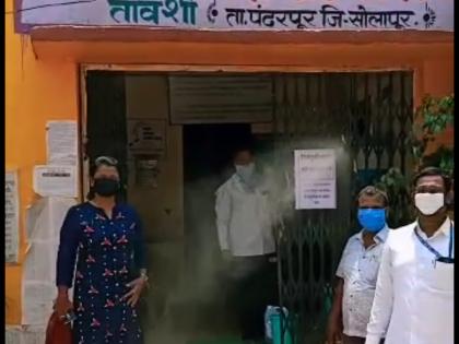 The first Gram Panchayat in Maharashtra to install a sanitizer pump at the Gram Panchayat office | ग्रामपंचायत कार्यालयात सँनिटायझर पंप बसवणारी महाराष्ट्रातील पहिली ग्रामपंचायत तावशी...!