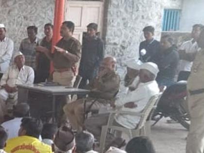 Ethnic reconciliation meeting in Talwade | तळवाडेत जातीय सलोखा बैठक