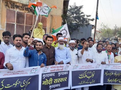 Protests in Malegaon against Malik's arrest | मलिकांच्या अटकेच्या निषेधार्थ मालेगावी निदर्शने