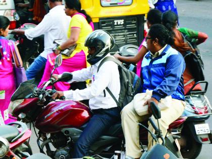 Half-yearly paperweight by two bikes | बारावीचे पेपरवाटप चक्क दुचाकीवरून