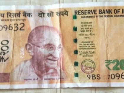 Forged note of 5 in Kajgaon market | कजगावच्या बाजारात २०० ची बनावट नोट