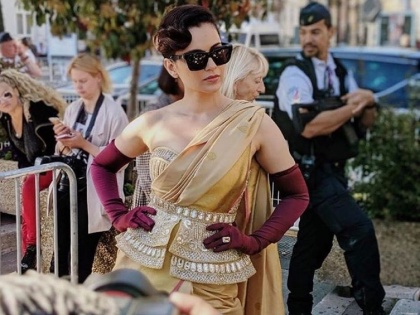 Cannes 2019: Kangana Ranaut gives Kanjeevaram saree a fierce twist in France | Cannes 2019: कान्समध्ये कंगना राणौतची धूम! गोल्डन कलरच्या साडीत घेतली रॉयल एन्ट्री!