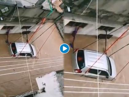 Jugaad : Man did amazing jugaad to save car to flood water ties car with ropes like this in Telangana watch viral video | वाह रे जुगाड! कार वाहून जाऊ नये म्हणून एकाने केली कमाल, व्हिडीओ पाहून लोक हैराण