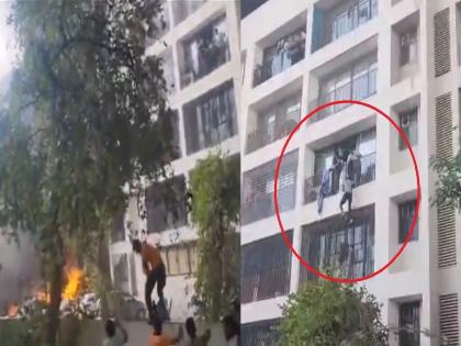 ahmedabad plane crash Horrifying moment Students jump from hostel balcony as plane crashes, heart-stopping new VIDEO | भयावह क्षण...! विमान कोसळताच विद्यार्थ्यांनी हॉस्टेलच्या बाल्कनीतून मारल्या उड्या, समोर आला हृदयाचा ठोका चुकवणारा नवा VIDEO