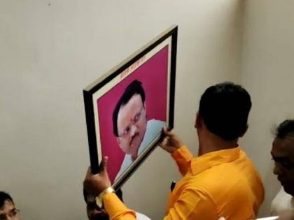 Photo taken of Ajit Pawar in NCP office, incident in Solapur | राष्ट्रवादीच्या कार्यालयातील अजित पवारांचा फोटो काढला, सोलापूरतील घटना