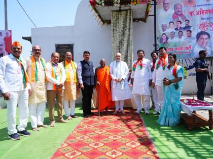 Amit Shah's welcome in Akola city! Welcome arches, plaques and rangolis attract attention | अमित शाह यांचे अकोला शहरात जल्लोषात स्वागत! स्वागत कमानी, फलक अन् रांगोळ्यांनी वेधले लक्ष