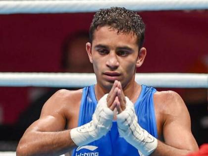 Asian Games 2018 Amit Panghal wins gold medal in Mens 49 kg Boxing final | Asian Games 2018: बॉक्सर अमित पांघलचा सोनेरी ठोसा, भारताला 14वे सुवर्णपदक