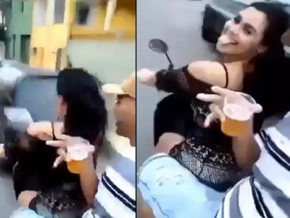 Viral Video: Couple's booz party on a running scooty; Then the accident happened, watch the video | Video: धावत्या स्कूटीवर कपलची दारू पार्टी; तेवढ्यात झाला अपघात, पाहा व्हिडिओ...