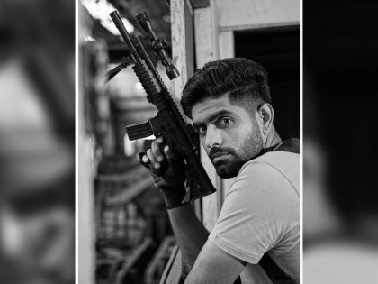 Pakistan captain Babar Azam posts a photo with a gun in hand social media trolls roast him in brutal fashion | Babar Azam Gun Photo: Pakistan च्या बाबर आझमने हाती बंदुक घेतलेला फोटो केला पोस्ट; नेटकऱ्यांनी केलं तुफान Troll