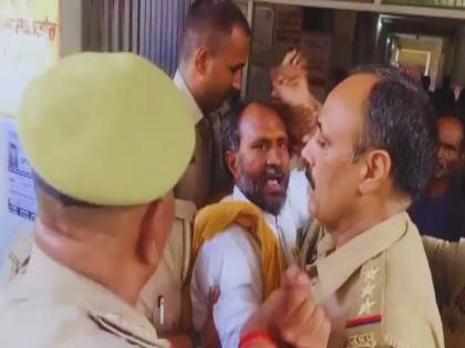 Munna Singh, a BJP leader accused of attacking Goverment officer arrested by police | Video: भाजपा नेत्याला खेचत घेऊन गेले पोलीस; कार्यकर्ते बघतच राहिले, बलियात नेमके काय घडले? Munna Singh, a BJP leader accused of attacking Goverment officer arrested by police | Video: भाजपा नेत्याला खेचत घेऊन गेले पोलीस; कार्यकर्ते बघतच राहिले, बलियात नेमके काय घडले?