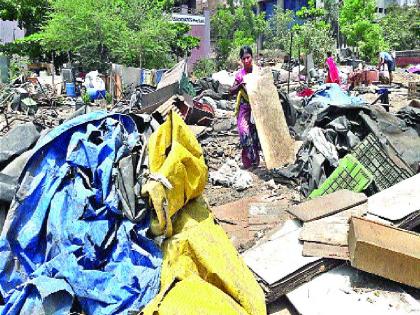 Action on slum in front of grain market | धान्य मार्केटसमोरील झोपडपट्टीवर कारवाई '