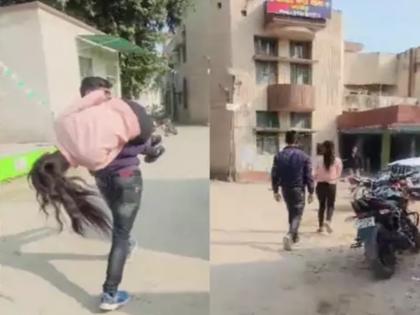 the young man started running with his girlfriend on his shoulder After the argument video viral | वादानंतर गर्लफ्रेंडला खांद्यावर घेऊन पळू लागला तरुण; विचित्र घटनेनं खळबळ