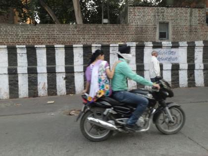 Man kills wife after seeing her on bike with colleague | पत्नी ऑफिसमधल्या सहका-याच्या बाईकवर बसली म्हणून पतीने कोयत्याने वार करुन केली हत्या