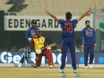 IND vs WI, 1st T20I Live Updates : Ravi Bishnoi break Sachin Tendulkar record on his T20I debut, Fifty by Nicholas Pooran in 38 balls,  | IND vs WI, 1st T20I Live Updates : रवी बिश्नोईने पदार्पणातच सचिन तेंडुलकरचा १६ वर्षांपूर्वीचा विक्रम मोडला; पण, निकोलस पूरनने विंडीजचा डाव सावरला