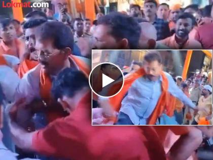 BJP MLA falls from activist's shoulder, video goes viral | ...अन् आमदार सुरेश भोळे पडले खाली; गणपती मिरवणुकीतील व्हिडीओ व्हायरल