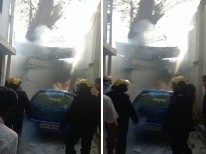 A car suddenly caught fire near Bharat Petrol Pump on Tilak Road in Pune | Video: पुण्यात टिळक रस्त्यावरील भारत पेट्रोल पंपाजवळ कारने अचानक घेतला पेट