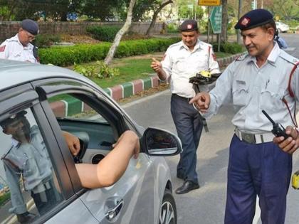 delhi traffic police constable dragged on car bonnet for 800 metres by ertiga driver | संतापजनक! लायसन्ससाठी अडवलं; चालकाने पोलिसालाच बोनेटवरून फरफटत नेलं