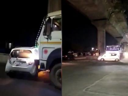 Drunk truck driver drags car with passengers for 2 km in UP's Meerut; shocking video | शुल्लक कारणामुळे वाद; संतापलेल्या कंटेनर चालकाने कारला 2 KM फरफटत नेले, VIDEO व्हायरल...