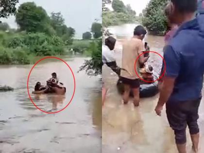 Ai tuzh lekeru... Tube travel for sick baby, Mauli makes her way through flood in buldhana | आई तुझं लेकरू... आजारी बाळासाठी ट्युबवरुन प्रवास, माऊलीनं पुरातून काढला मार्ग