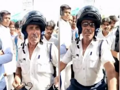 Threatened by the youth, the traffic constable started crying in front of the crowd; The video went viral in rajashtan | युवकाची धमकी, ट्रॅफिक हवालदार गर्दीसमोरच रडायला लागले; व्हिडिओ व्हायरल