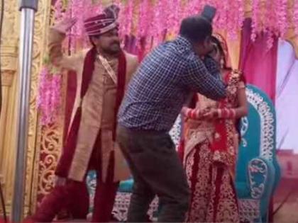 Real story about Viral video bride groom slap photographer | फोटोग्राफरनं पोझसाठी नवरीला केला स्पर्श, नवरदेवानं दिली थापड; असं आहे 'त्या' व्हायरल व्हिडिओ मागचं सत्य!