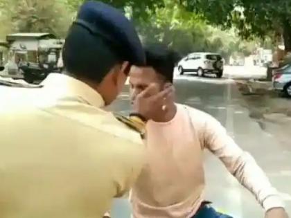 Uttar pradesh acp slaps five in five seconds to hoodlum who is harassing the girl student in kanpur VIDEO VIRAL | 5 सेकंदांत 5 झणझणीत थापडा, छेडछाड करणारा मवाली ACP नं धू-धू धुतला; VIDEO व्हायरल