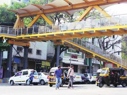 MNS protests against pedestrian bridge in front of Singhania school | धूळ खात पडणारा स्कायवॉक नको; पार्किंग प्लाझा उभारा, सिंघानिया शाळेसमोर पादचारी पुलाला मनसेचा विरोध