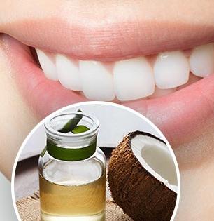 दात होतील चमकदार, दुर्गंधी होईल दूर; खोबऱ्याच्या तेलाचा फक्त 'या' दोन पद्धतीने करा वापर!