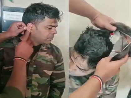 Man did cheating in UP police exam, put wig on his head and uses earphones | डोक्यावर विग आणि कानात इअरफोन, पोलिस भरती परीक्षेत कॉपी करणारा अटकेत