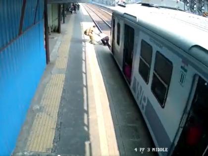 mumbai police constable helped 60 year old man who got stuck at a railway track | थरारक VIDEO! एक सेकंद उशीर झाला असता तर...; पोलीस कर्मचाऱ्यामुळे टळला अनर्थ