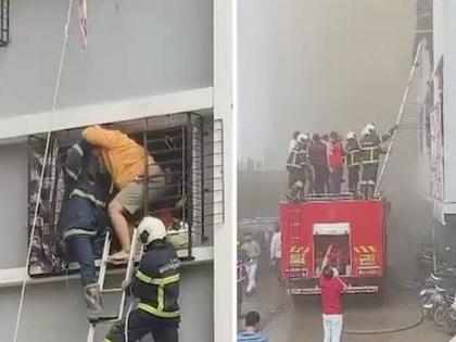 Fire breaks out in 24-storey SRA building in Dahisar; Woman dies, 18 people undergoing treatment | दहिसरमध्ये २४ मजली एसआरए इमारतीला आग; महिलेचा मृत्यू, १८ जणांवर उपचार सुरु Fire breaks out in 24-storey SRA building in Dahisar; Woman dies, 18 people undergoing treatment | दहिसरमध्ये २४ मजली एसआरए इमारतीला आग; महिलेचा मृत्यू, १८ जणांवर उपचार सुरु