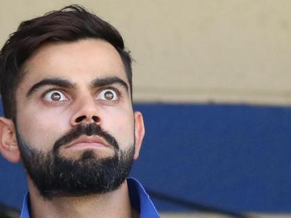 India vs West Indies, 1st Test: Virat Kohli is taking book to reduce anger, he becomes troll | India vs West Indies, 1st Test : राग कमी करण्यासाठी कोहली घेतोय पुस्तकाचा आधार, फोटो झाला ट्रोल