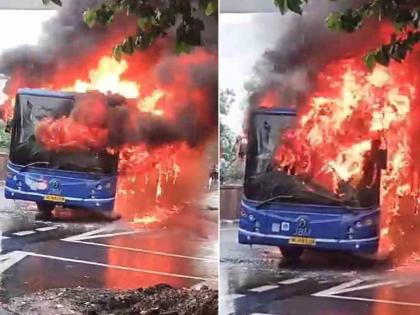 Delhi DTC bus suddenly caught fire passengers narrowly escaped | VIDEO : दिल्लीत प्रवाशांनी भरलेल्या बसने घेतला पेट; बाईकवरच्या तरुणाने वाचवला सगळ्यांचा जीव