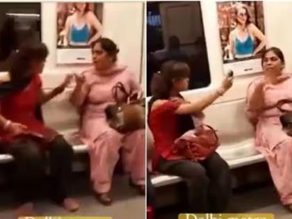 Video woman attacks co passenger with pepper spray in delhi metro | Video: मेट्रोमध्ये 2 महिला भिडल्या, एकमेकींच्या जीवावर उठल्या; डोळ्यांवर मारला पेपर स्प्रे अन्...