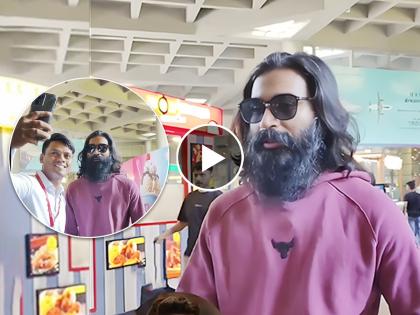 Dhanush look with long hair and beard viral on social media | डोळ्यांवर गॉगल, वाढलेले केस अन् दाढी; बदललेल्या लूक 'या' अभिनेत्याला ओळखणं झालंय कठीण, तुम्ही ओळखलंत का?