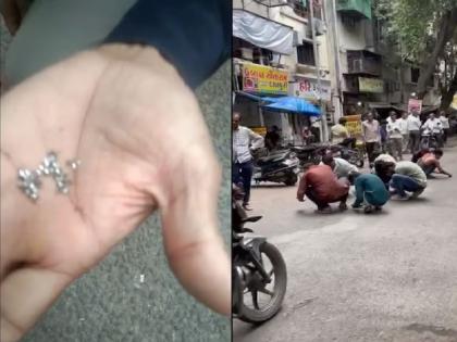 people collecting diamonds scattered on road of surat diamond market video goes viral | अरे बापरे! रस्त्यावर पडलेले हिरे उचलण्यासाठी लोकांची झुंबड; नेमकं काय घडलं?