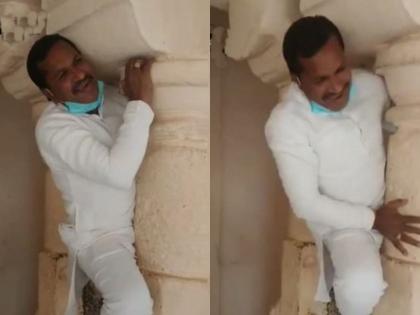 MLA Dilip Makwana trapped in two pillars of sin-religion video viral | अरे देवा! पाप-पुण्य मोजायला गेले अन् भाजपा आमदार 2 खांबामध्ये अडकले; Video तुफान व्हायरल