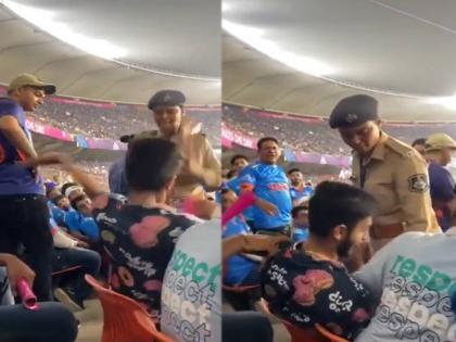 During ICC ODI World Cup 2023 match between IND vs PAK at Narendra Modi Stadium women police and a spectator fight, video goes viral | IND vs PAK मॅचदरम्यान हाणामारी! महिला पोलिसाने थप्पड मारताच प्रेक्षकानेही उचलला हात, VIDEO