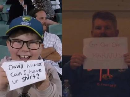 During the 1st ODI match between Australia and England, David Warner and a small fan had a conversation through the poster | AUS vs ENG: "मला तुझा शर्ट मिळेल का", चिमुकल्याच्या आग्रहाला वॉर्नरने 'पोस्टर'द्वारे दिले उत्तर, पाहा मजेशीर किस्सा