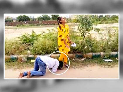 boy touches  girls feet on roads to ask for votes viral video student election in Rajasthan watch | निवडणुकीआधी उमेदवाराने भररस्त्यात मुलीच्या पायावर घातलं लोटांगण