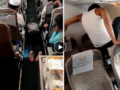 A passenger onboard a Pakistan International Airlines (PIA) flight enroute to Dubai from Peshawar, allegedly created a ruckus on the plane mid-air, Video  | Video : विमान हवेत झेपावलं, पाकिस्तानी प्रवाशाचं डोकं फिरलं; सिट्सवर बुक्का, पायानं काच तोडण्याचा प्रयत्न अन्...