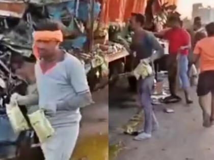 jhansi truck accident rush to loot ghee pouches on highway video viral | अरेरे! ट्रकचा भीषण अपघात; रस्त्यावर पडलेले तुपाचे पाऊच लुटण्यासाठी लोकांची झुंबड