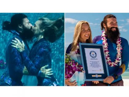 Underwater Kiss World Record: Valentine's Day Special; A couple made a world record by kissing underwater for 4 minutes | व्हॅलेंटाईन डे स्पेशल; आगळा-वेगळा विक्रम; पाण्याखाली 4 मिनिटे चुंबन, गिनीज बुकमध्ये नोंद