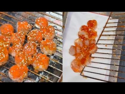 Grilled ice is real street food in China weird snack goes viral | बाबो! स्ट्रीट फूडच्या नावावर इथे विकला जात आहे भाजलेला बर्फ, आवडीने खातात लोक!