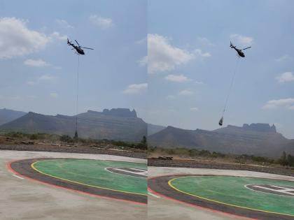 The use of helicopters to build towers in remote mountain ranges is the culmination of the Mumbai Energy Road Project. | दुर्गम डोंगर रांगांत टॉवर उभारणीसाठी चक्क हेलिकॉप्टरचा वापर, मुंबई ऊर्जा मार्ग प्रकल्पाची प्रयत्नांची पराकाष्ठा 