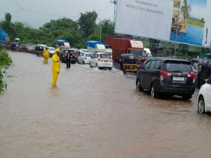 Ghodbunder road and highway jammed due to inundation of water | पाणी तुंबल्याने घोडबंदर मार्ग व महामार्ग जाम 