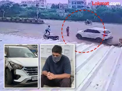 2 people killed in Gujrat by policemen who were racing with SUV father handed over to police | शर्यतीच्या नादात पोलीस अधिकाऱ्याच्या मुलाने दोघांचा उडवलं; बापाने चोप देत पोलिसांकडे सोपवलं 2 people killed in Gujrat by policemen who were racing with SUV father handed over to police | शर्यतीच्या नादात पोलीस अधिकाऱ्याच्या मुलाने दोघांचा उडवलं; बापाने चोप देत पोलिसांकडे सोपवलं