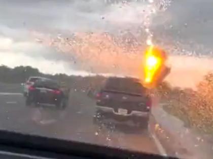 Lightning struck the husbands Car from the sky; The wife was recording the video of Rain | काय तो पाऊस, काय तो नजारा! तेवढ्यात पतीवर आकाशातून वीज कोसळली; पत्नी Video रेकॉर्ड करत होती