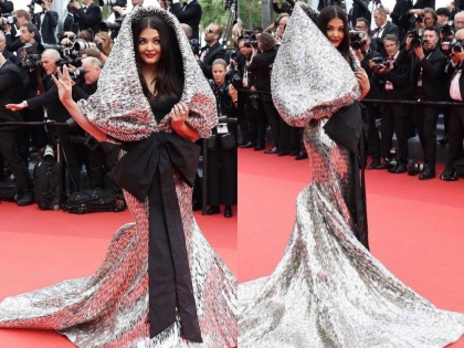 aishwarya rai bachchan cannes 2023 red carpet look trolled on internet wearing silver hudie | Cannes 2023 : सिल्व्हर हुडीत ऐश्वर्याची कान्सच्या रेड कार्पेटवर एंट्री, Video पाहून नेटकरी म्हणाले, "धड चालताही..."